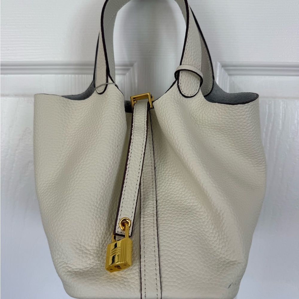 Cameido Cream Pebbled Leather Tote with Gold Padlock Accent